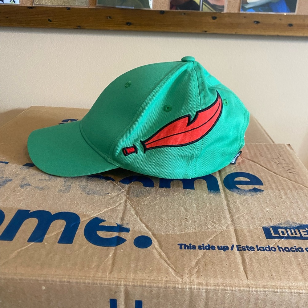 Cakeworthy Peter Pan Green Feather Embroidered Hat